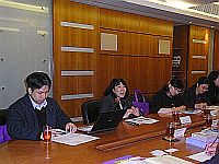 Mrs. Grace Chow (2nd from right), Office of Admissions and Financial Aid, explains to the delegation from Tsinghua University the admission procedure for mainland students